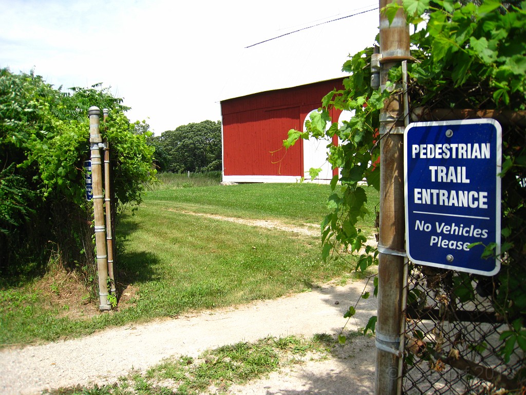 Matthaei Botanical Gardens 2010 0705.jpg - Next to the large red barn is the start, or end, of the trail on the North end of the park.